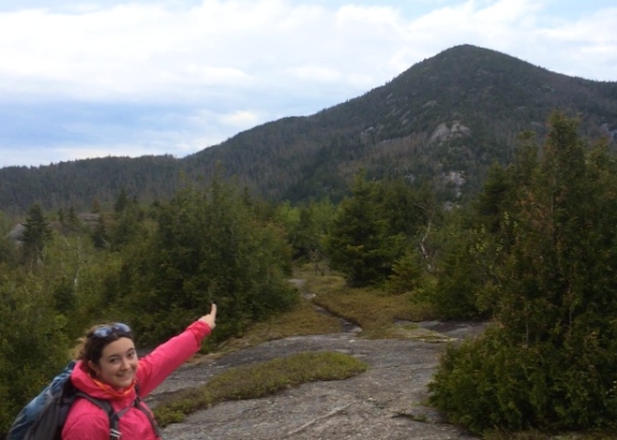 Tiera pointing to our next destination, Rocky Peak